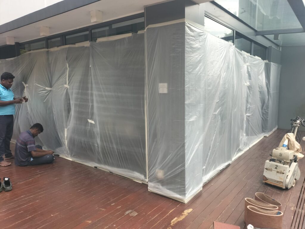 Protecting home before timber deck grinding