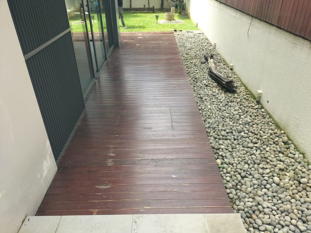 Before photo of timber deck grinding